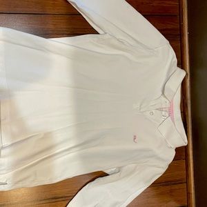 White long sleeve polo with pink logo.